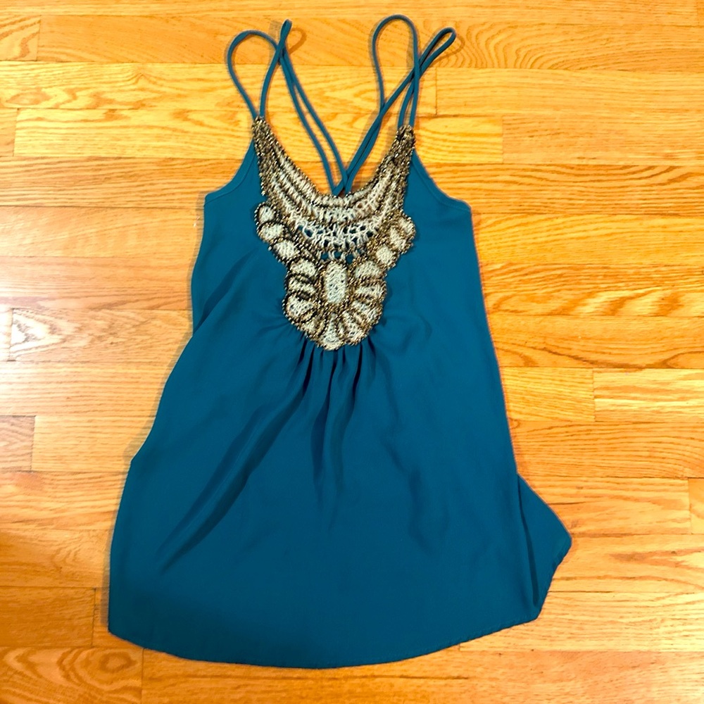 Y2K Limite green tank top with gold black and cream mesh on top.